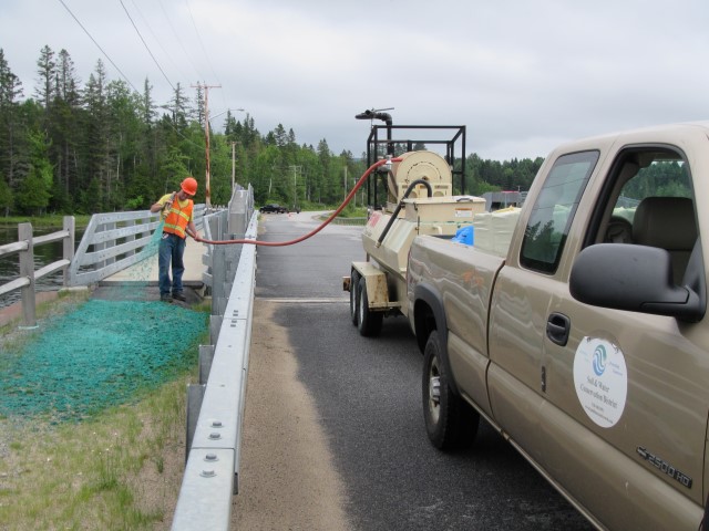 Hydroseeding  on the side of a bridge by theHamilton County Soil and Water Conservation District (52)